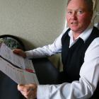 Dunedin man Geoff Thomson with the Contact Energy power bill and letter sent to himself and wife...