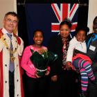 Dunedin Mayor Dave Cull with  new New Zealand citizens (from left) Ruvarashe Manonose (11), her...