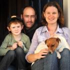 Dunedin parents Gary and Sharon Soal with son Linkin and the family dog Mazy in Dunedin yesterday...