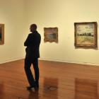 Dunedin Public Art Gallery director Cam McCracken with works from the collection at the gallery...