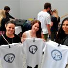 Dunedin residents (from left) Amanda Gould, Shanaya Allan and Melissa Cottle show their screen...