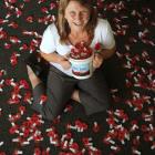 Dunedin RSA welfare officer Maggy Brownlie with some of the 45,000 poppies to be distributed in...
