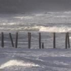 Dunedin's historic St Clair Beach poles just before high tide yesterday. Photo by Craig Baxter.