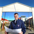 Dunedin Salvation Army Glenn Anderson studies plans for a redevelopment of the central city site,...