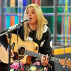 Dunedin singer/songwriter Kylie Price performs at the Dunedin City Library yesterday. Photos by...