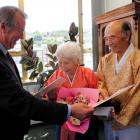 Dunedin solicitor Alistair Paterson performed his first naturalisation ceremony for Kil Hyan Ji ...