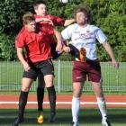 Dunedin Technical players Campbell Attwood (left) and Rory McLeod compete for the ball with...