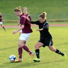Dunedin Technical's Coral Seath (left) is challenged by Coastal Spirit's Annalie Longo during the...
