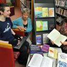 Dunedin writer Rowan Stanley (21) types on a laptop, with literary assistance from librarians...