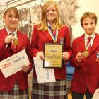 Dunstan High School pupils (from left) Charlotte Stringer, Stine-Lise Budge and NIck Pascoe, all...
