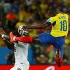 Ecuador's Walter Ayovi (R) fights for the ball with France's Moussa Sissoko. REUTERS/Kai Pfaffenbach