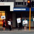 Educators gather outside the office of National list MP Michael Woodhouse in an early morning...