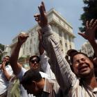 Egyptians chant slogans in front of the presidential palace of Egypt's President Mohamed Mursi,...