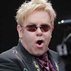 Elton John is shownb in this file photo during his  open-air concert at the Gerry-Weber-Stadium...