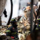 Emergency responders search through the rubble at the site of the explosion in Harlem. REUTERS...