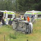 Emergency services attend Saturday's crash at Tarras. Photo by Sarah Marquet