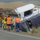 Emergency services attend the scene of a serious crash on State Highway 1 on Saturday. Photo by...
