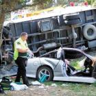 Emergency services personnel attend the scene of a fatal crash just north of the Waitaki River...