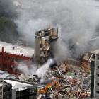 Emergency workers search for survivors in the rubble at the CTV building in Madras St,...