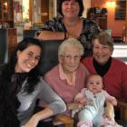 Emily Duffy (93), of Dunedin, holds Isabella Scott (3 months), of Queensland, surrounded by (from...