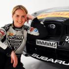 Emma Gilmour sits in front of her Subaru Impreza she will drive in the Targa New Zealand. Photo...