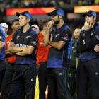 End of the dream . . . New Zealand players watch the presentation ceremony after their loss in...