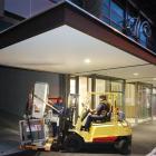 Engineering equipment for Fisher and Paykel Appliances is offloaded at a parking bay at Wall...