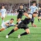 England reserve halfback Ben Youngs runs in to score the game's only try during Saturday night's...