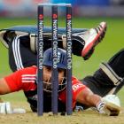 England's Ravi Bopara dives into the crease during the fourth one-day international against India...