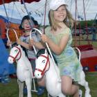Enjoying a ride on a carousel at the Brighton Gala Day are (from left) Rueben (3) and Alex (7)...
