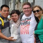 Enjoying  some ''fush and chups'' in Port Chalmers yesterday are cruise-ship passengers (from...