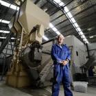 Envirofocus Ltd operations manager Trevor Ferguson inside the company's Mosgiel fertiliser plant,...