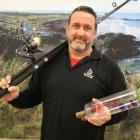 Environment Southland environmental technical officer Doug Keith with  a ''bob'' water sampling...