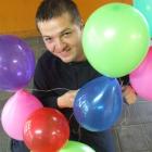 Eugen Dupu is hoping to establish a world record by having at least 10,000 inflated balloons in...
