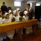 Experiencing education in a stricter 19th century style at the Otago Settlers Museum yesterday...