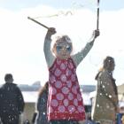 Fair float . . . Amira Johnson (3), of Mosgiel, makes bubbles. "Modern gypsy" . . . Wheelie Fun...