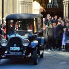 Family and friends pay their last respects to Dame Dorothy Fraser  yesterday as a 1926 Chrysler...