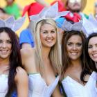 Fans pose during the 2013 Wellington Sevens at Westpac Stadium. (Photo by Hagen Hopkins/Getty...