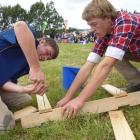 Robert Gregory and Richard Gardyne construct a saw horse in the TeenAg competition held in...