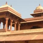 Fatehpur Sikri, meticulously carved in pink stone, was once the glorious capital of the Indian...