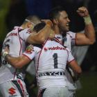 Feleti Mateo and Kevin Locke of the Warriors celebrate after Locke he scored a try during the...