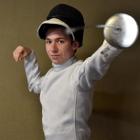 Fencer Louis Jennings (16), of John McGlashan College, takes guard at his school last week. Photo...