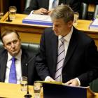 Finance Minister Bill English reads his 2012 Budget in the House today. Photo NZ Herald