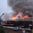 Firefighters tackle a huge blaze at the historic Aparima Tavern, Riverton, late yesterday...