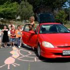 Flag Swamp School pupils (from left)  Lucy-Marie Grant (5), Alice Clarke (6), Skye Rea (8, rear),...