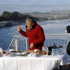 Flamboyant  Malaysian celebrity cook Datuk Chef Wan is filmed by cameraman Muhamad Fakrulrazi...