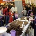 Food artist Prudence Staite demonstrates her chocolate food art at the Meridian Mall on Saturday....