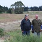 Forbury Park Trotting Club president Gerald Cayford and trainer Billy Heads on a hill above their...