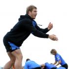 Force flanker David Pocock passes the ball at training at the Montecillo ground yesterday. Photo...