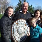 Former All Black and Otago player Don Clark with granddaughters (from left) Tia (12), Kesley (10)...